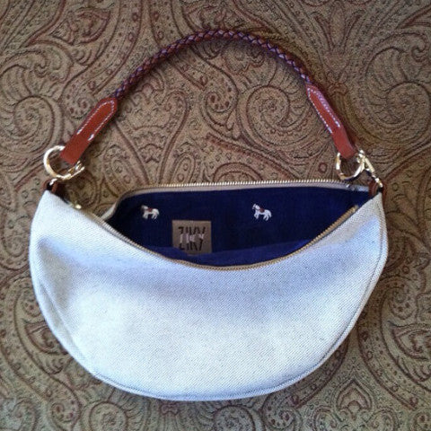 Purse with horse brow band handle