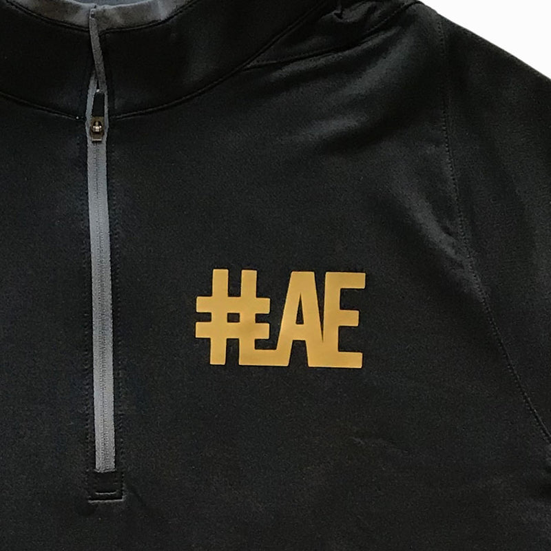 #LAE gold logo Nike shirt